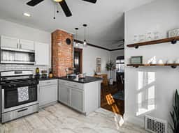 Charming 2BR Home Workspace and Porch - Image 3
