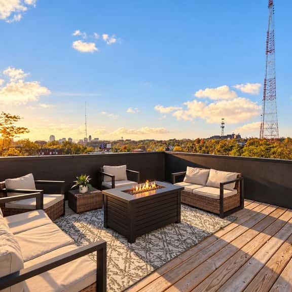 Rooftop Fire Table + Skyline · Near OTR & Stadiums - Image 1